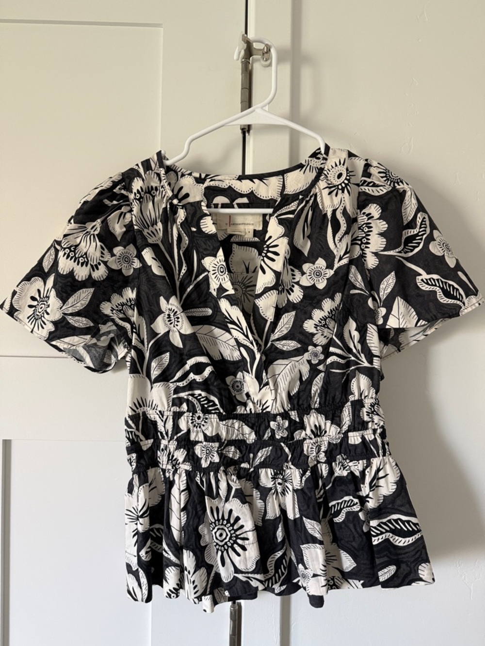 Anthropologie Black and White Floral Peplum Blouse